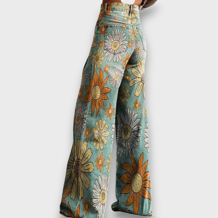 Fiorella – Jeans a gamba larga con stampa floreale retrò