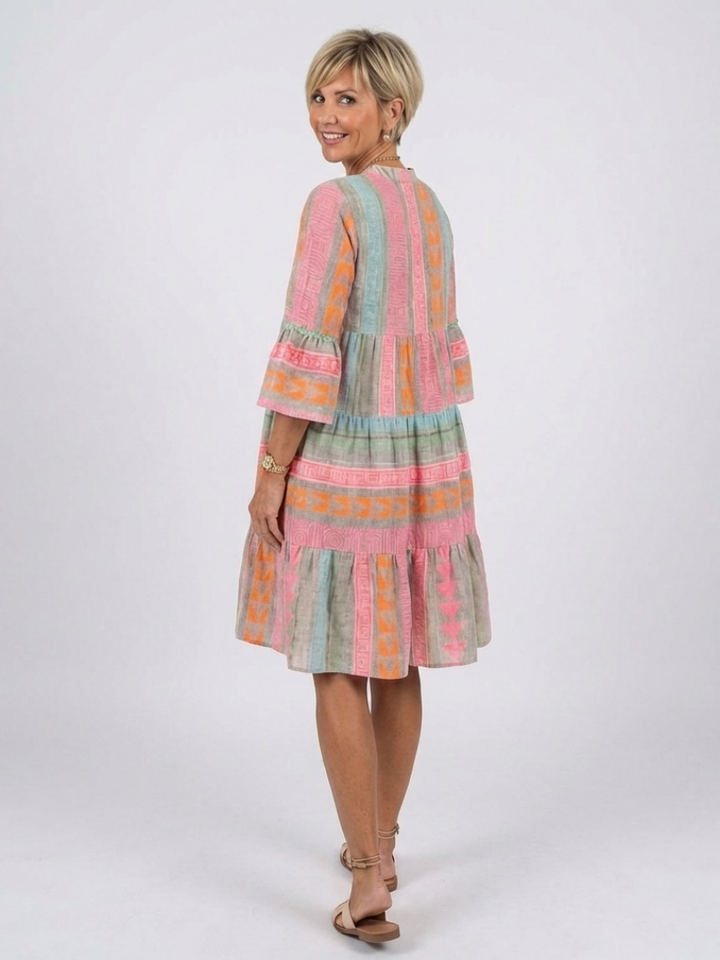 Emma | Vestito fino al ginocchio con scollo a V e volant, con stampa geometrica