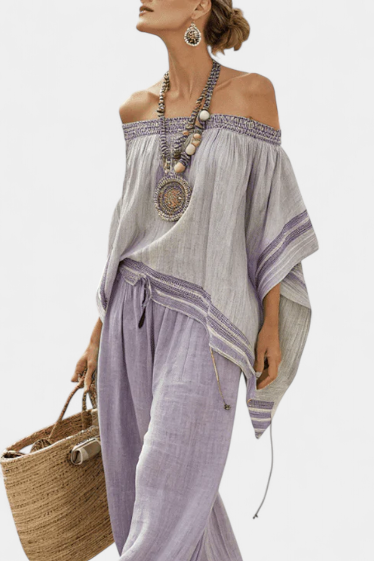 Serenella - blusa con spalle scoperte e pantaloni a gamba larga a righe
