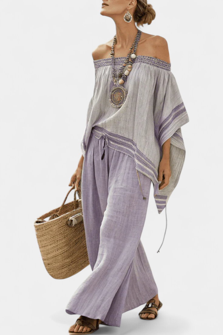 Serenella - blusa con spalle scoperte e pantaloni a gamba larga a righe