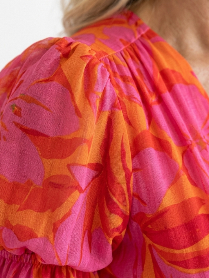 Alessia  | Vestito midi con stampa floreale, scollo a V e maniche a sbuffo