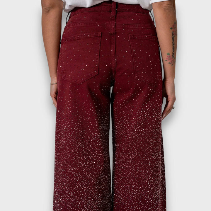 Marvie – Jeans a gamba larga con strass color bordeaux