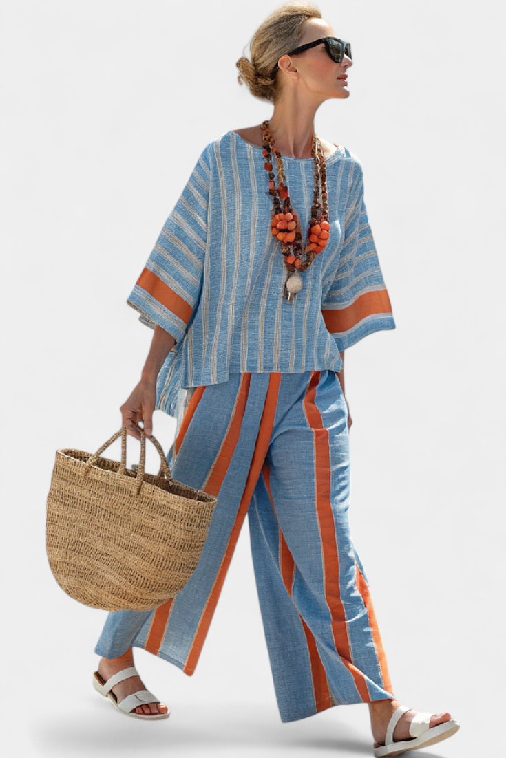 Valeria – top rigato terracotta sofisticato e pantaloni di lino