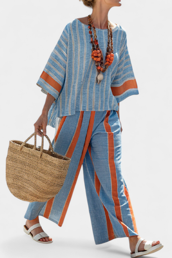 Valeria – top rigato terracotta sofisticato e pantaloni di lino