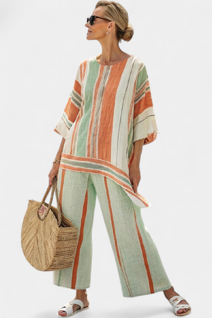 Elisabetta – top asimmetrico elegante e pantaloni a gamba larga