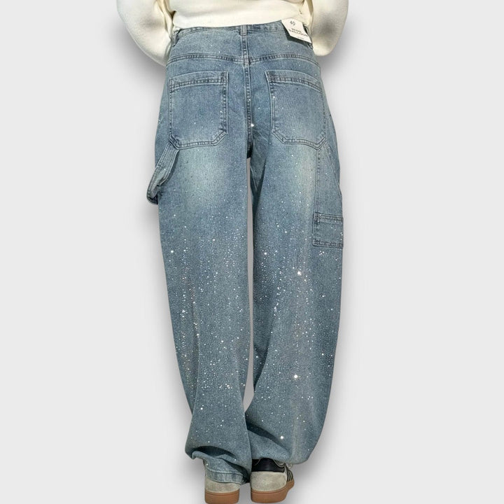 Nolene – Jeans con finitura lucida e carattere urbano