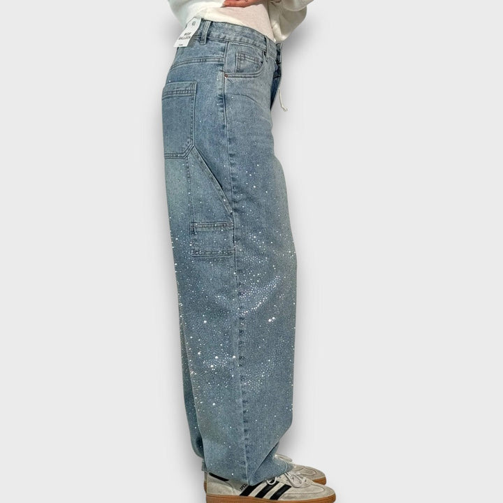 Nolene – Jeans con finitura lucida e carattere urbano