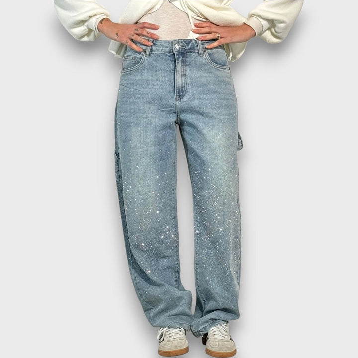 Nolene – Jeans con finitura lucida e carattere urbano